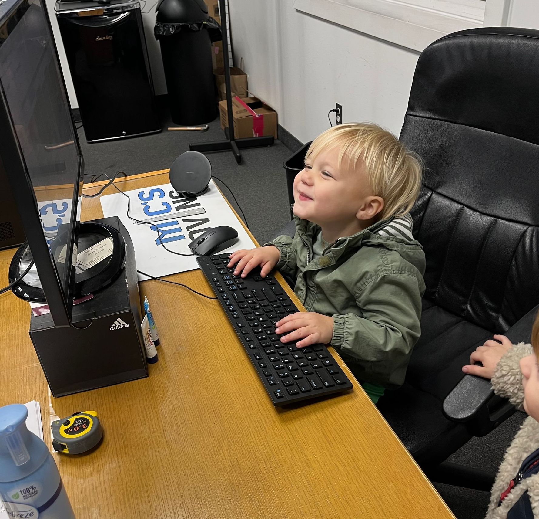 A group of Mic's Movers in business lobby ready to move a business.