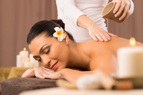 Spa Services — Woman Having A Back Oil Massage in Bethlehem, PA
