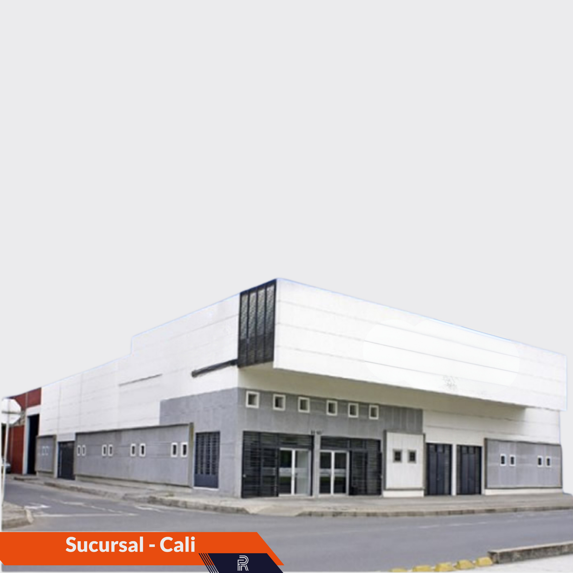 Exterior del edificio con fachada gris y blanca; texto superpuesto