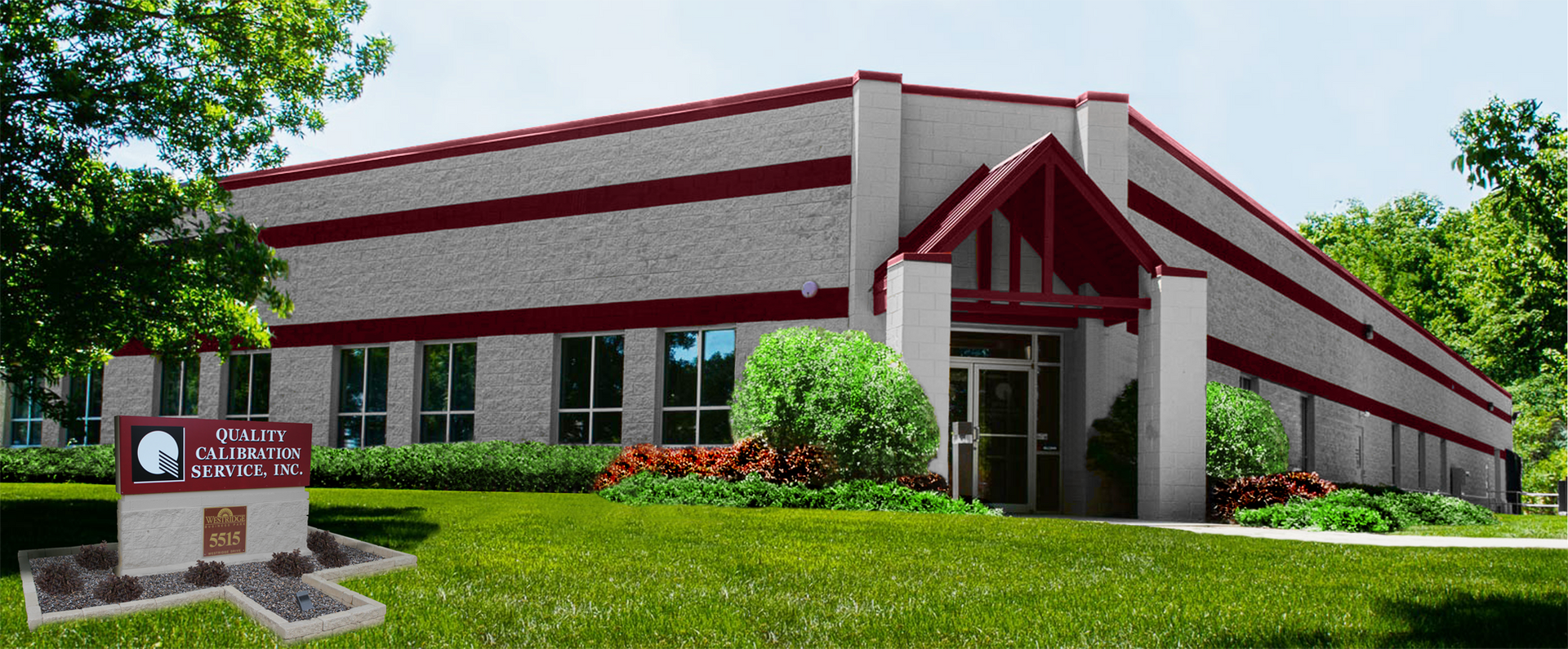 A Large Building With A Sign In Front — New Berlin, WI — Quality Calibration Services A Large Building With A Sign In Front — New Berlin, WI — Quality Calibration Services