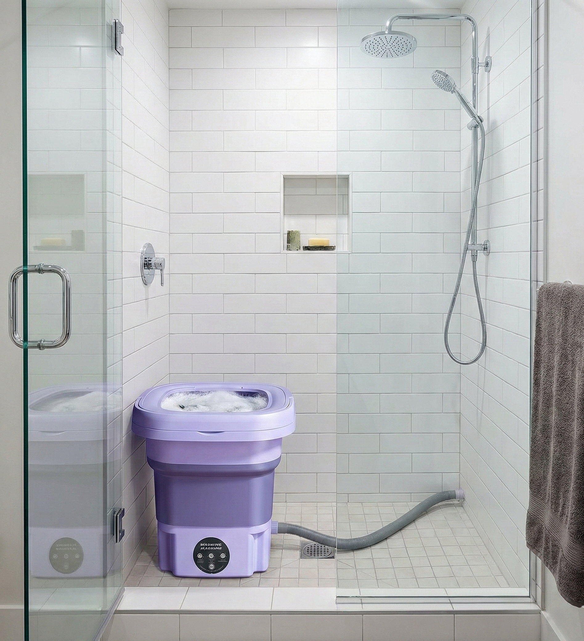 Purple portable washing machine inside a tiled shower stall.