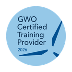 A circular light blue logo reading "GWO Certified Training Provider 2026" with a stylized wind turbine icon.