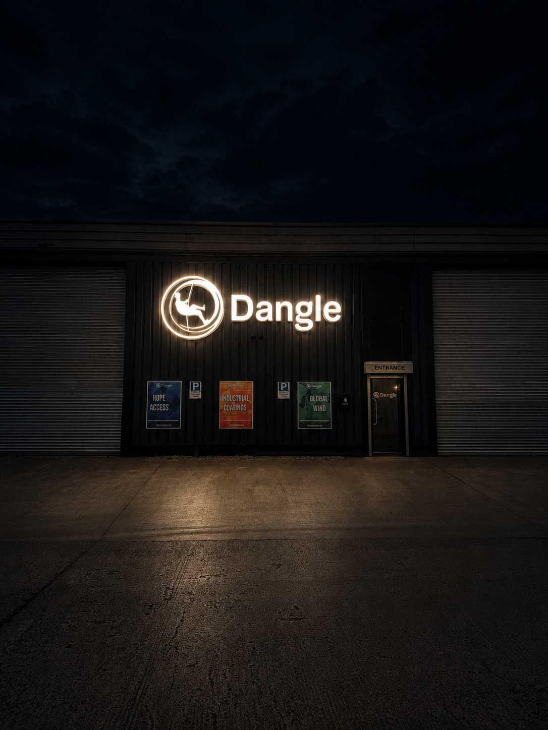 Nighttime office front with a glowing “Dangle” sign