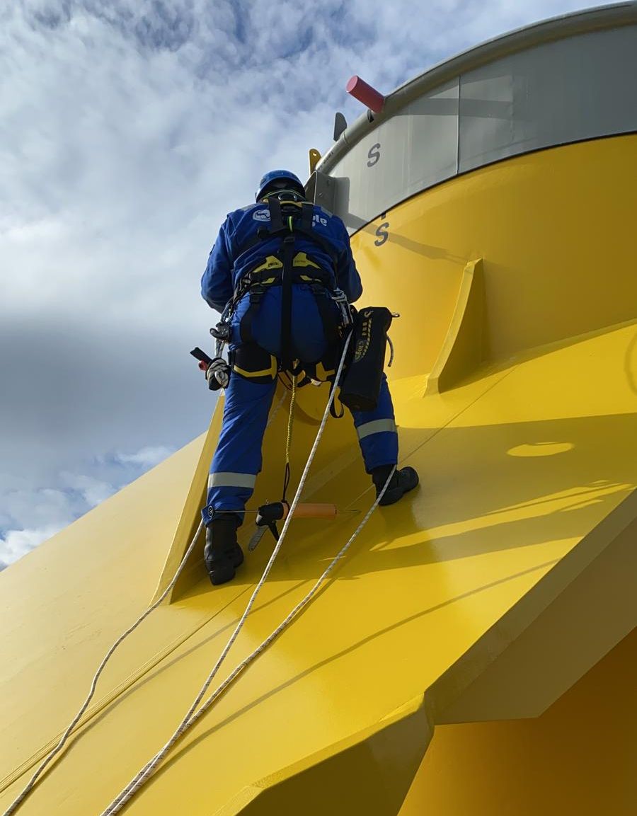 rope access painter painting moray east wind farm offshore
