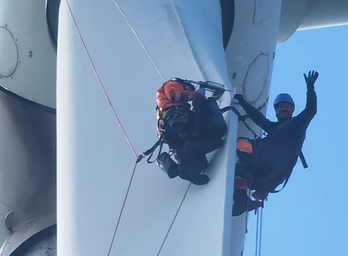 Rope Access Techs Repairing a Wind Turbine Blade