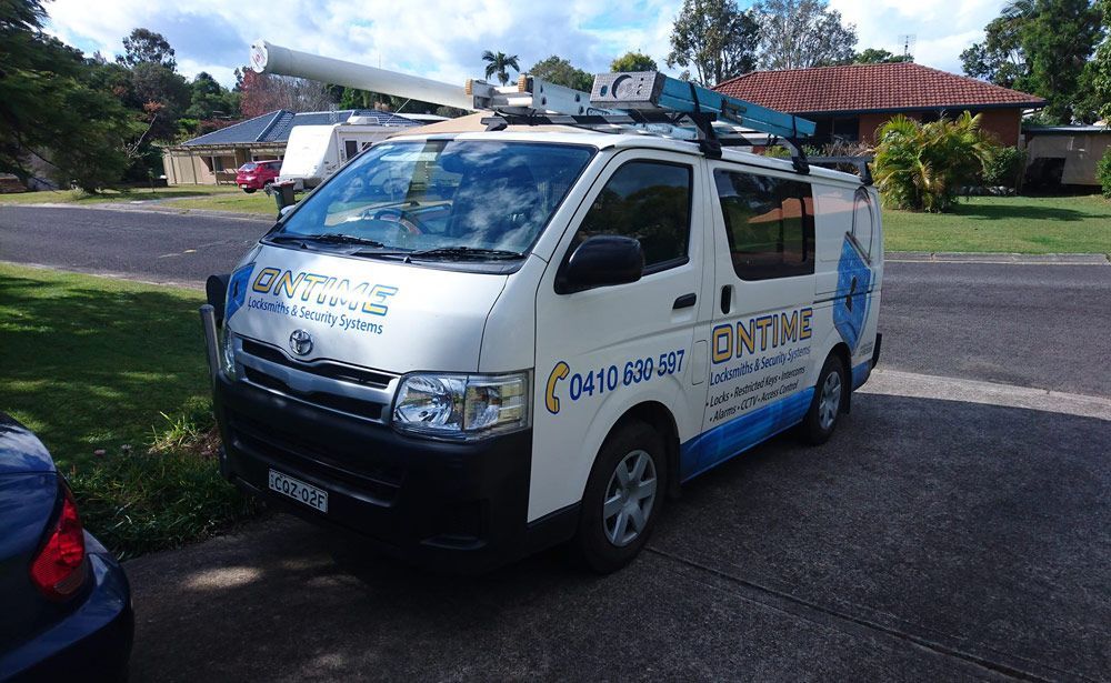 Van That Says Ontime On The Side And A Ladder On Top Of It — Ontime Locksmiths & Security In Mullumbimby, NSW