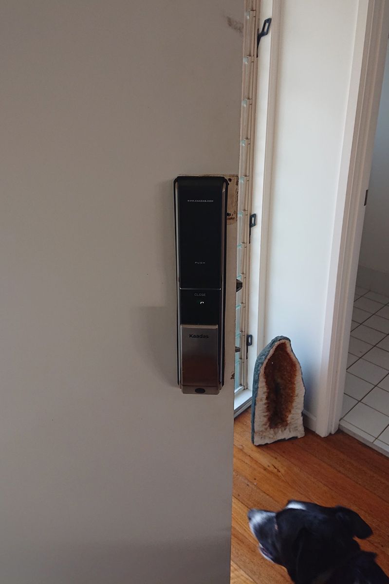 Digital Door Lock With A Passcode Placed On A Open White Door — Ontime Locksmiths & Security In Mullumbimby, NSW