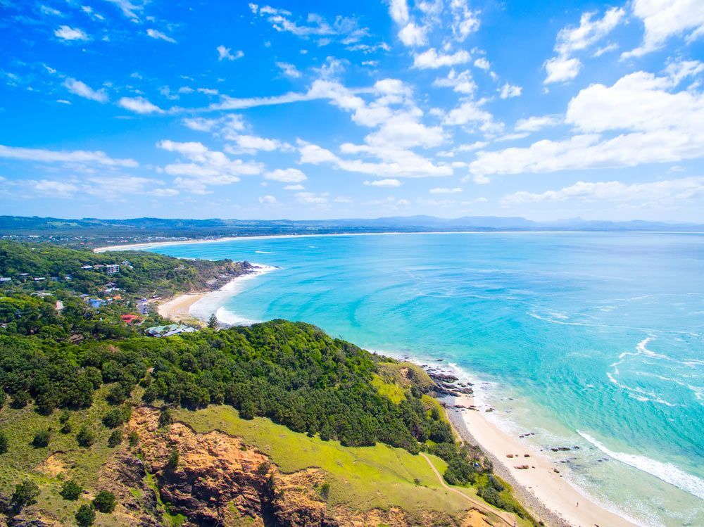 Aerial View Of A Beach Having Trees On A Shore, On A Sunny Day — Security Systems In Byron Bay, NSW