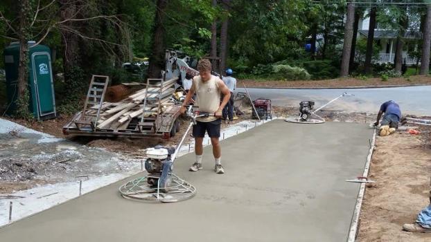 Concrete Contractor — Worker Constructing The Road in Greenwood, SC