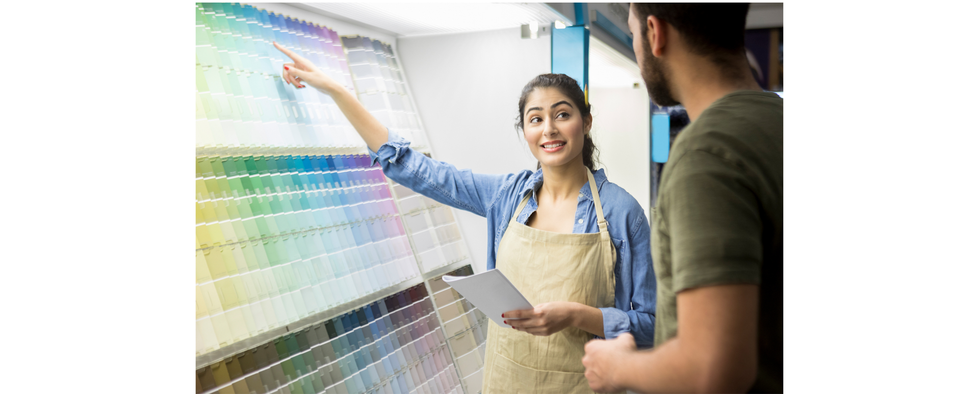 A Man is Looking at a Jar of Paint in a Store - Paint Shop in  Fyshwick, ACT