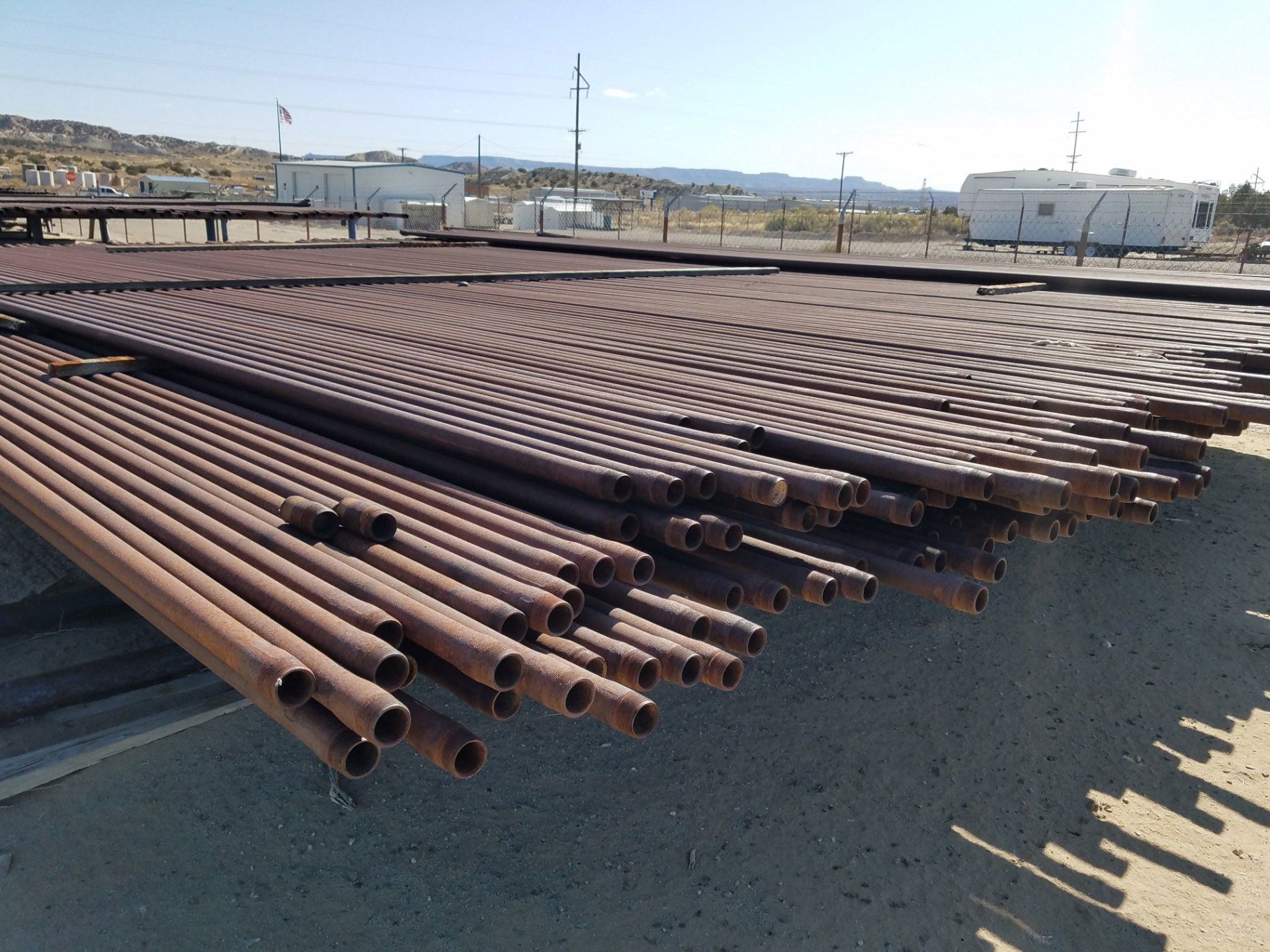 Properly Stacked Metal Pipes — Farmington, NM — Cave Enterprises