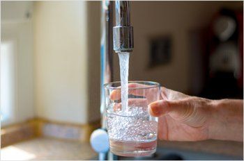 Filling a Glass of Water — Boulder & Denver, CO — Boulder / GNC Water Well
