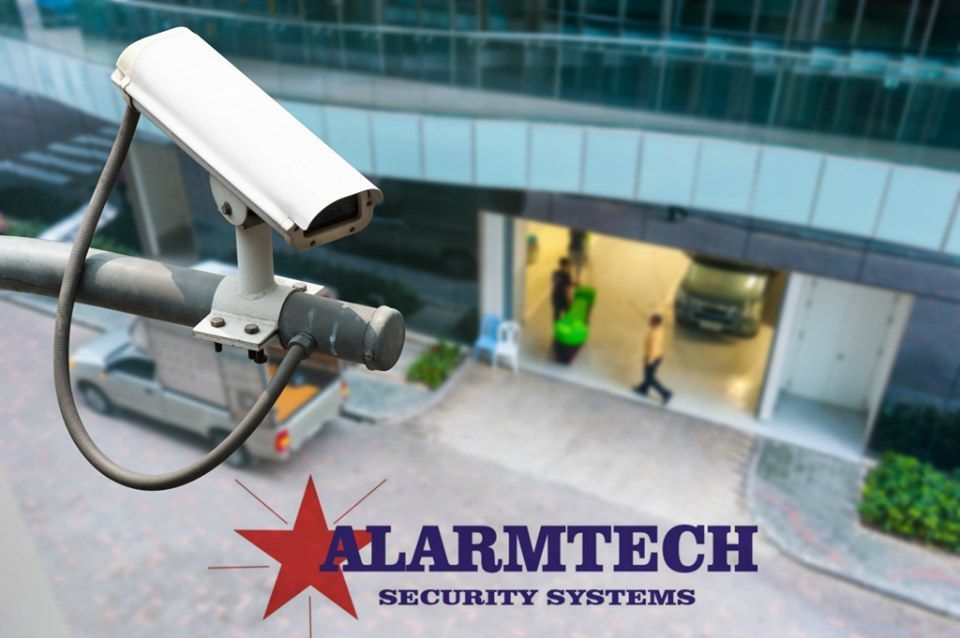 A security camera with the word alarmtech on it