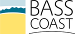 A logo for bass coast with a beach and mountains in the background.
