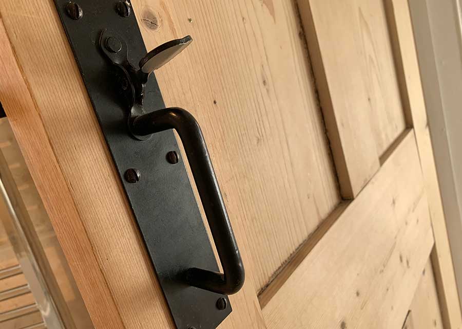 Close up photo of latch door handle