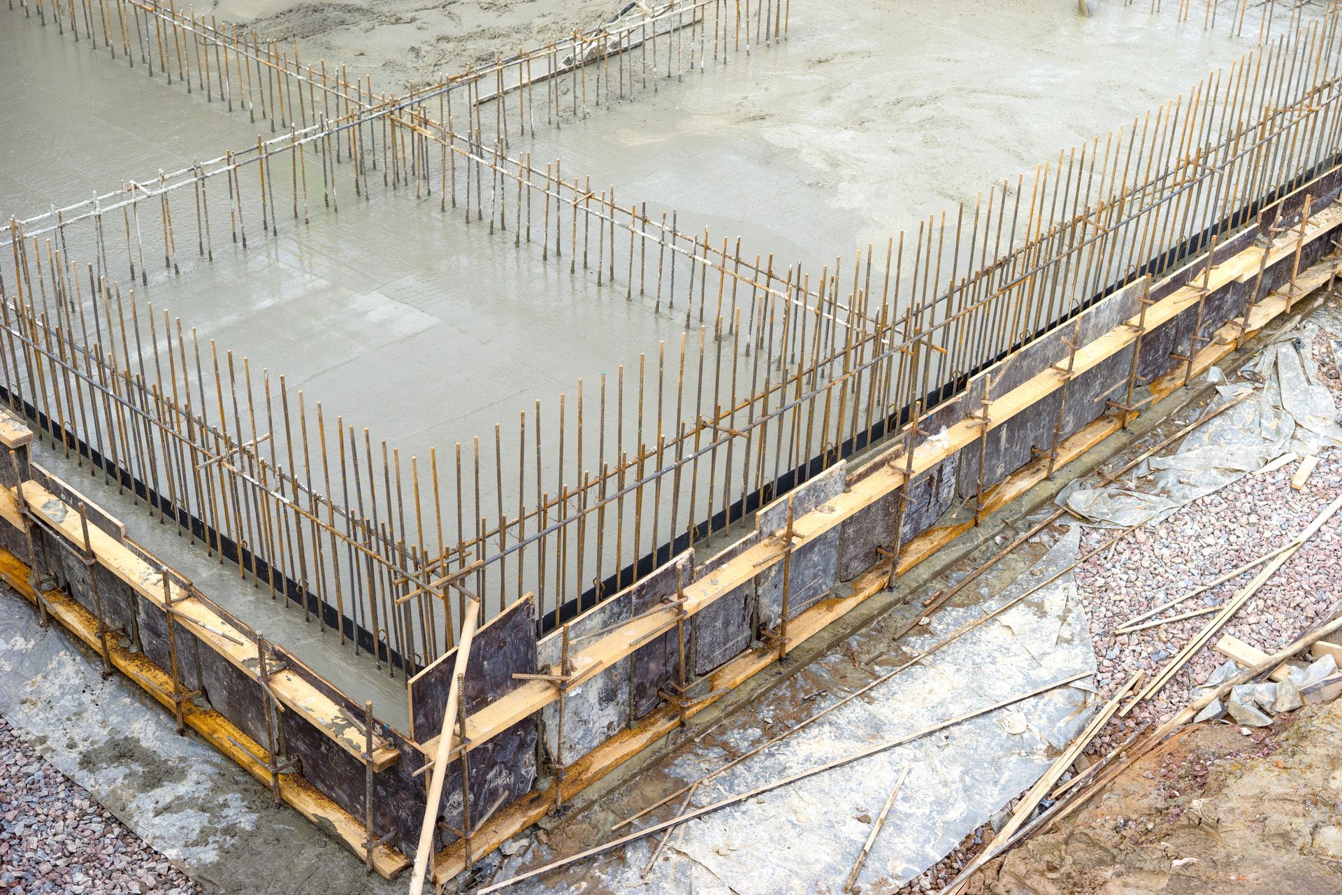 Monolithic foundation casting, fresh concrete poured into formwork