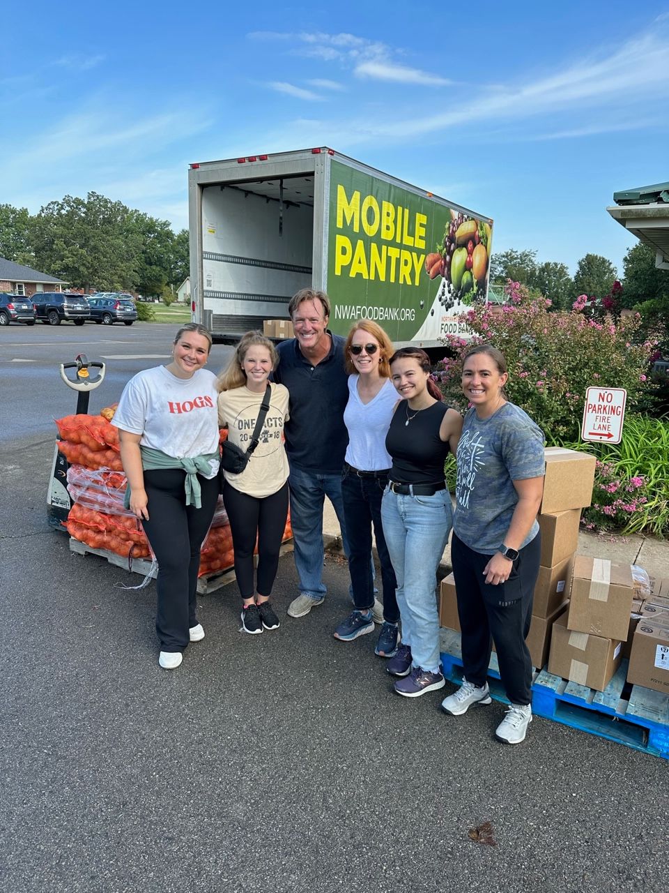 group volunteering at food bank