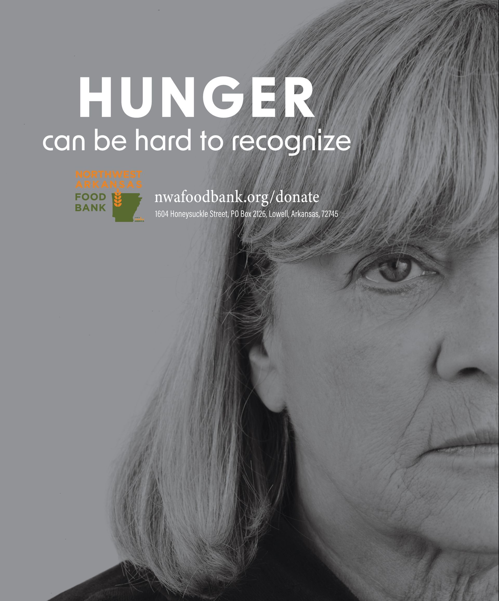 A black and white photo of a woman with the words hunger can be hard to recognize