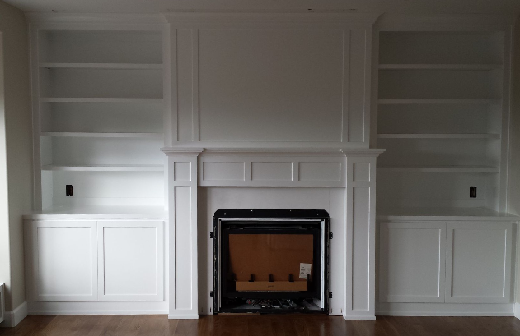 Cozy pet washing station with built-in steps, window seat, and wooden accents