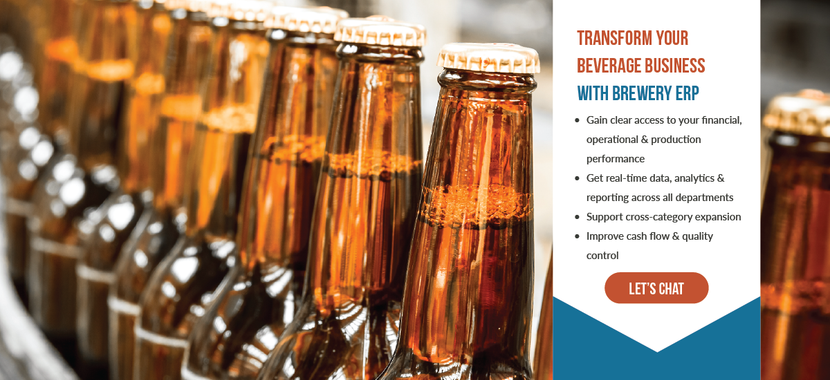 A row of beer bottles sitting on top of a conveyor belt.