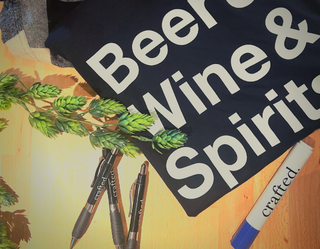 A t-shirt that says beer wine and spirits on it