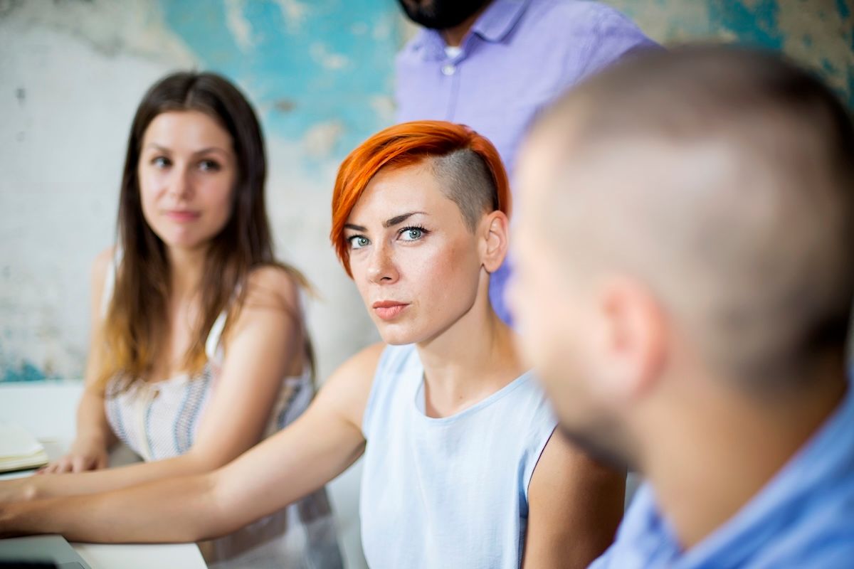 Group of distillery employees meeting to create a crisis plan