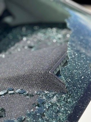 A car with a broken windscreen.