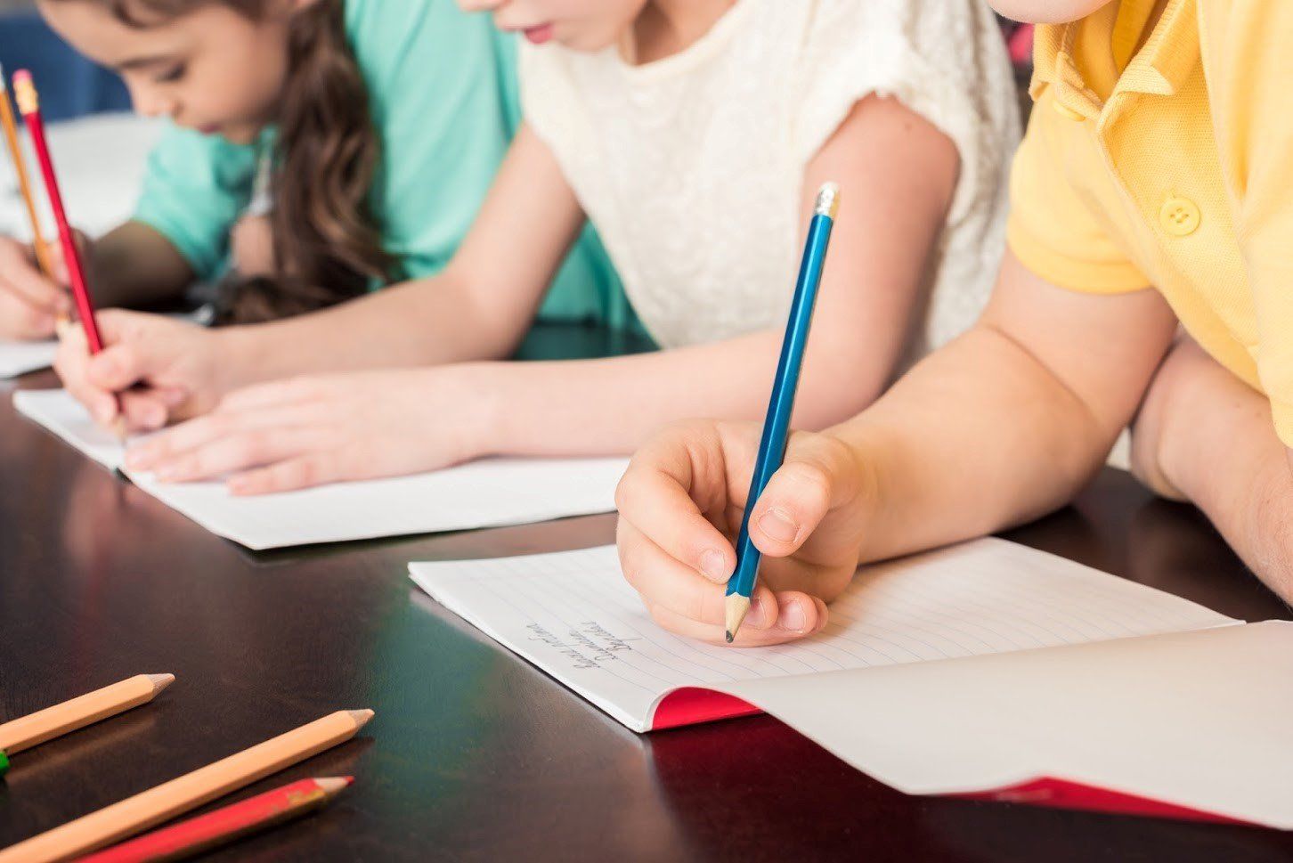 Child Writing On Notebook — Atlanta, GA — Cleanstar National, Inc.