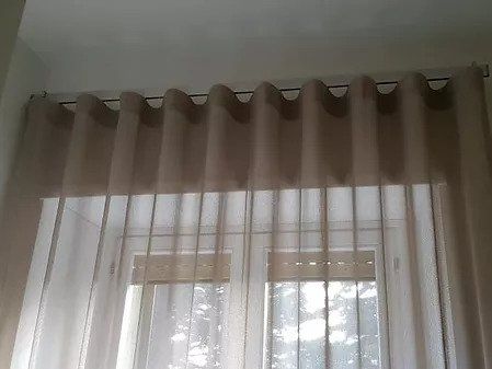 tende da interno in tessuto di vari colori