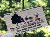 Business card for A to Z Trees and More LLC. Includes logo, services, and contact information.