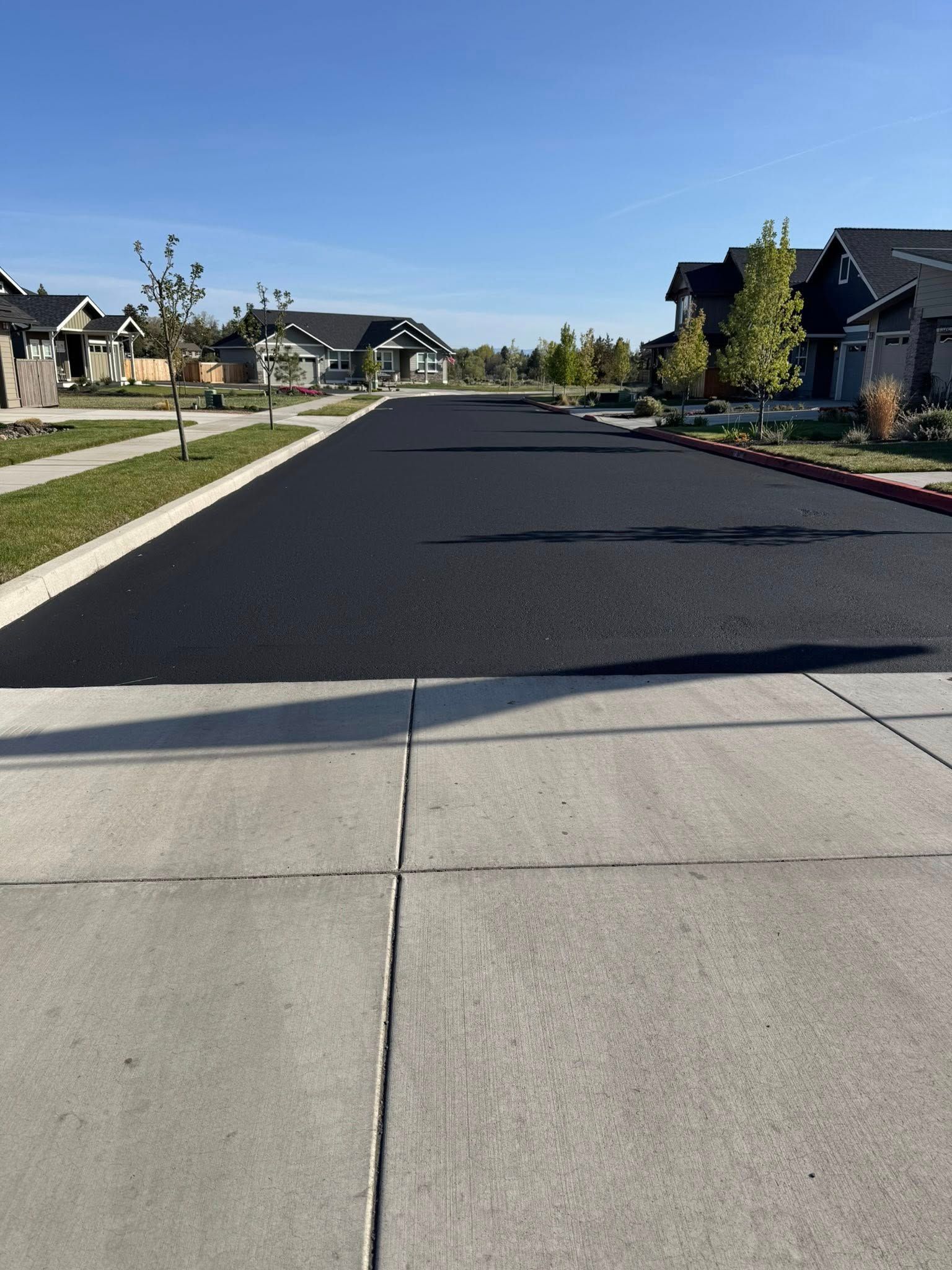 A residential street with a lot of houses on it
