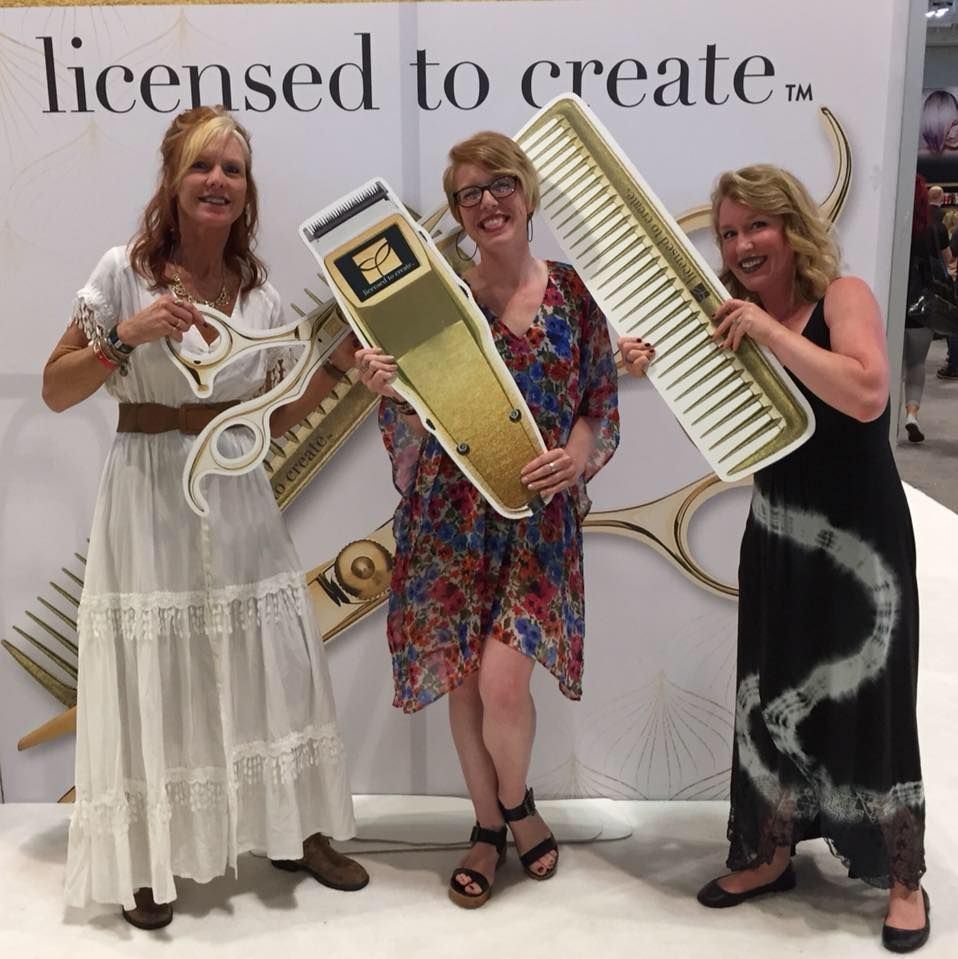 Three Women Holding A Salon Equipments — Lancaster, OH — The Ultimate Look