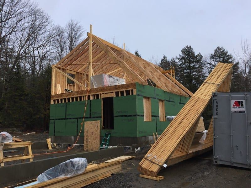 A house is being built with a lot of wood.