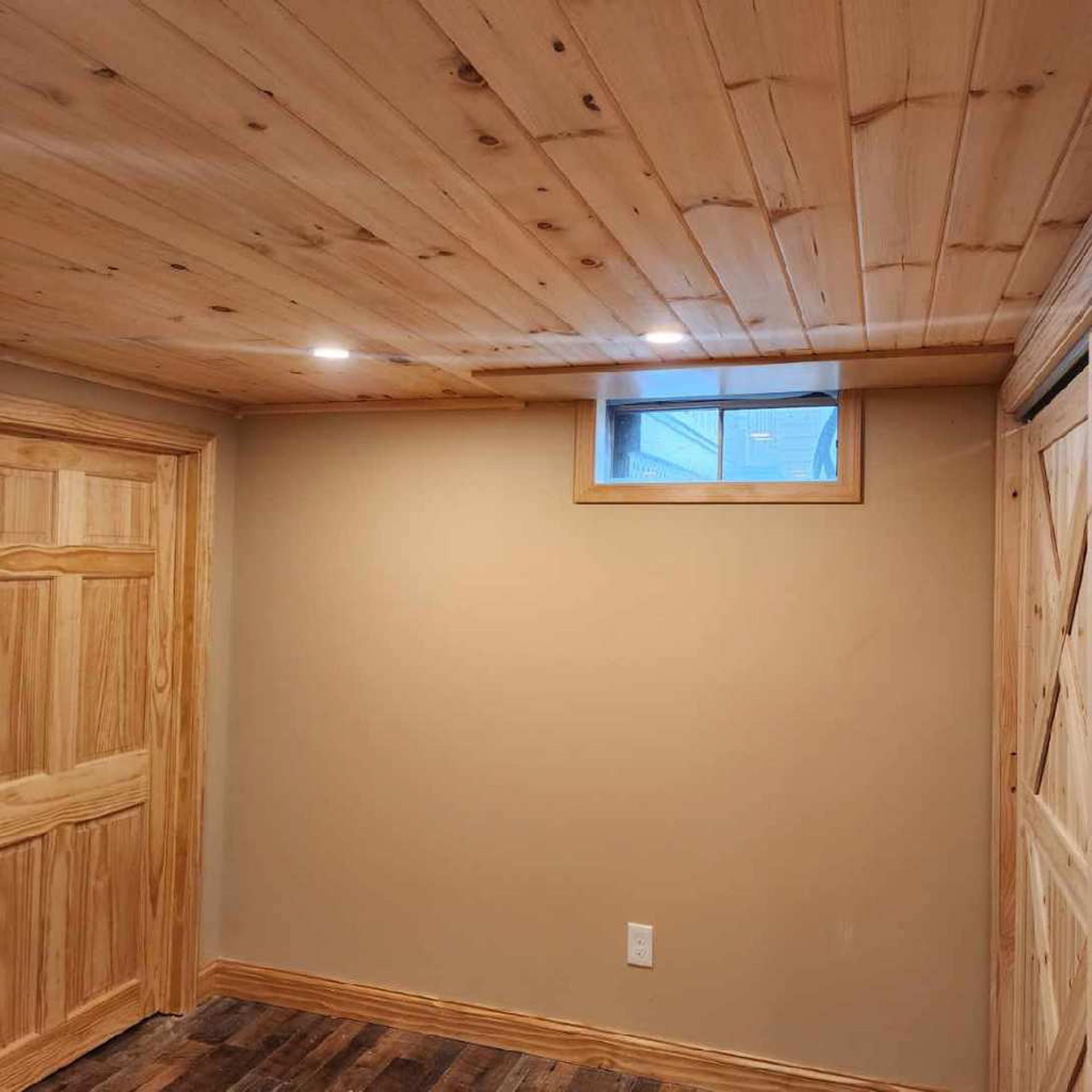 There is a window in the corner of the room.