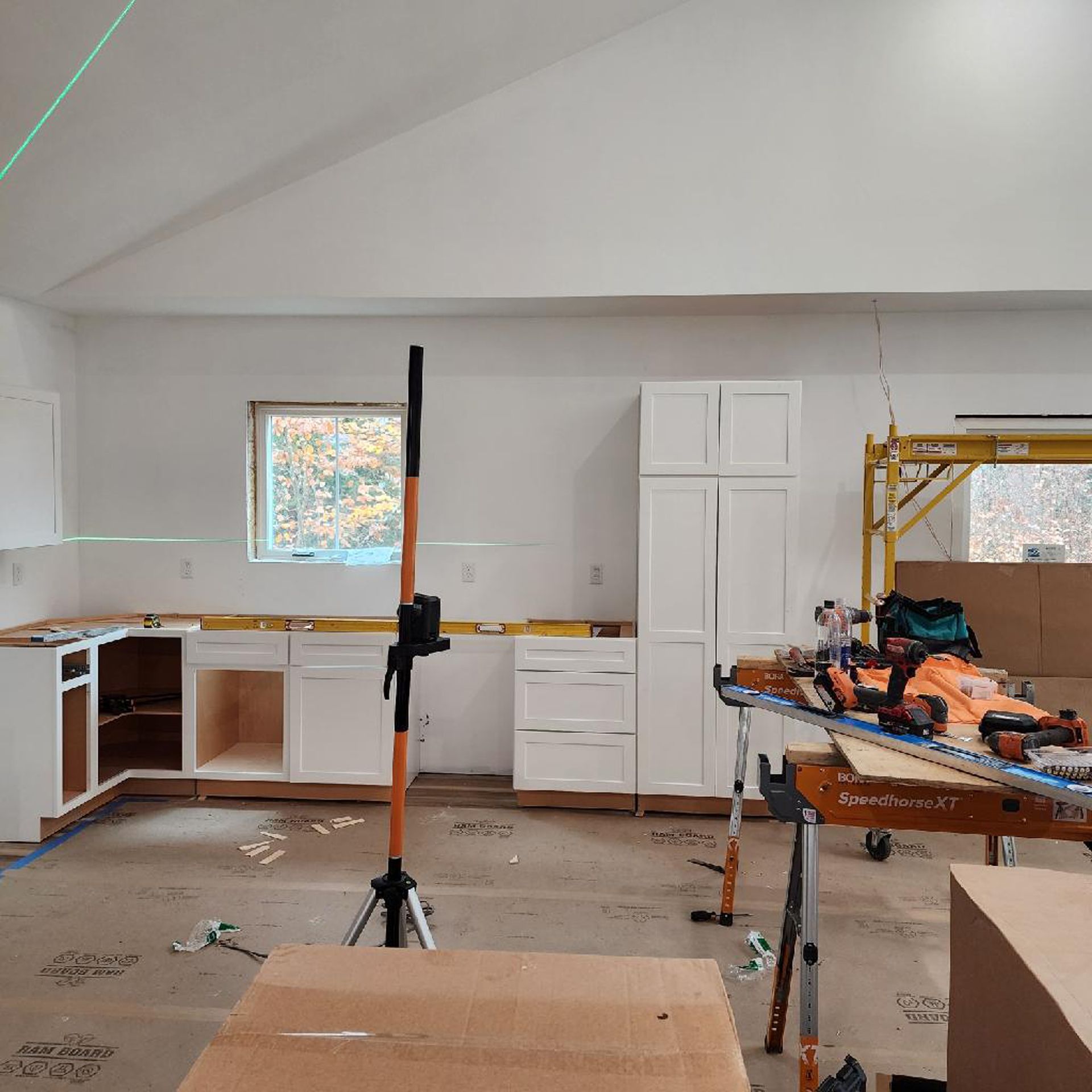 A room with a lot of boxes on the floor