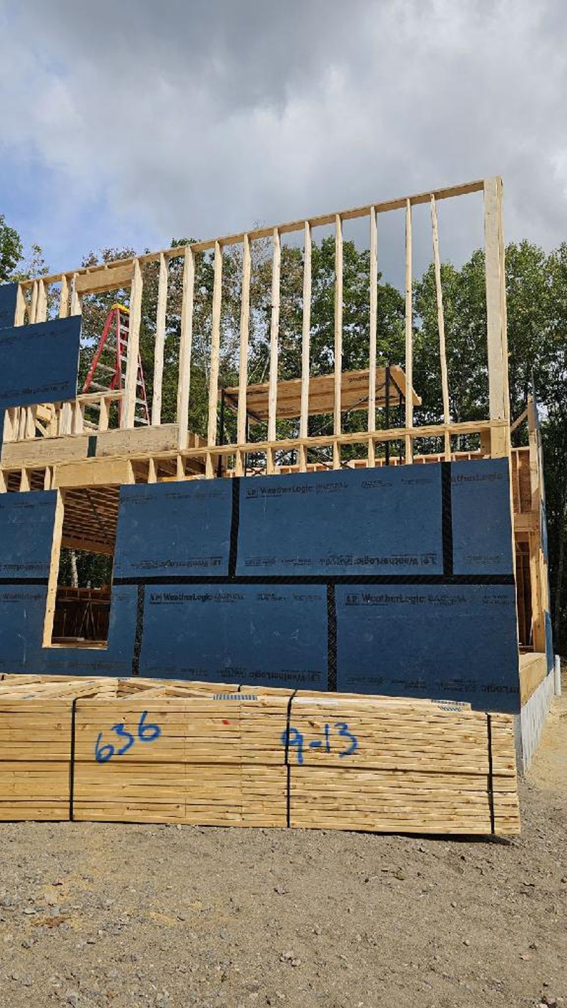 A house is being built with a lot of wood.