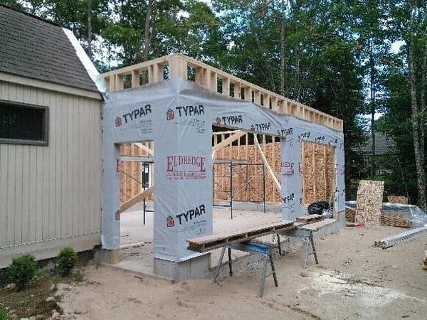 A house is being built with styrofoam on the walls.