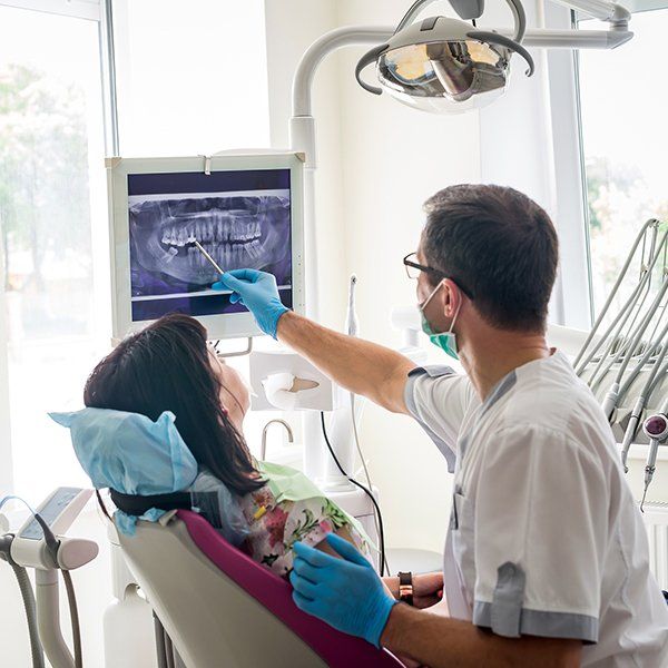 Dentist pointing at the x-ray result — Ashland and Ruther Glen, VA — Ashland Family Dentistry
