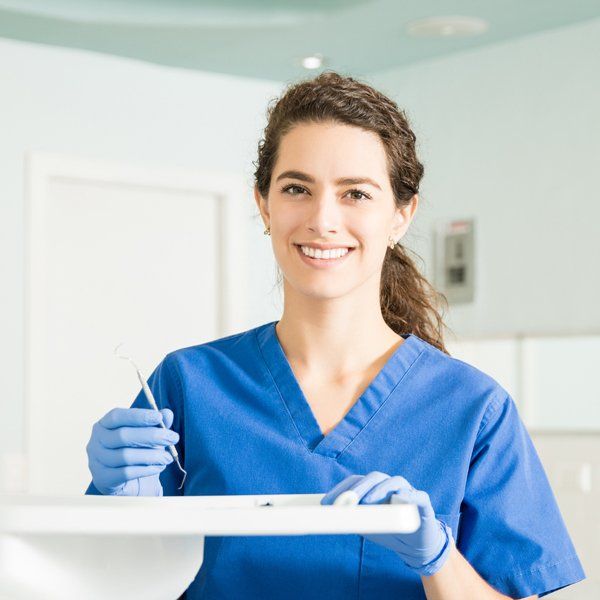 Smiling dental assistant — Ashland and Ruther Glen, VA — Ashland Family Dentistry