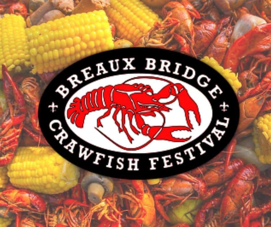 The breaux bridge crawfish festival logo is on a pile of crawfish