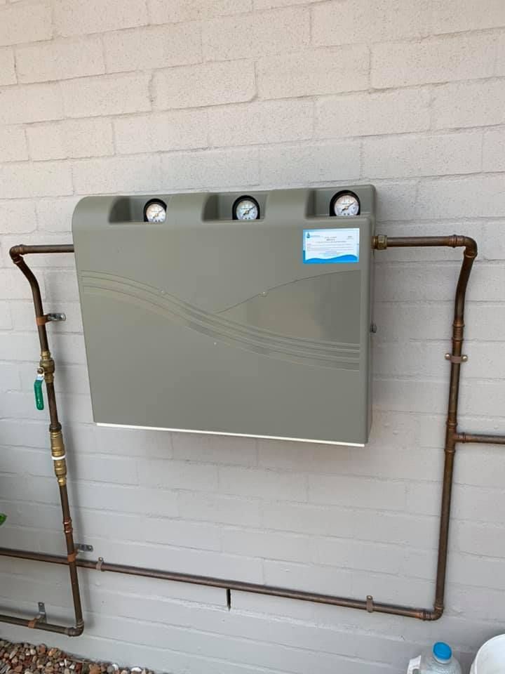 A Box With Three Gauges On It Is Attached To A Brick Wall – Moore Creek, NSW - Thrift Plumbing Pty Ltd