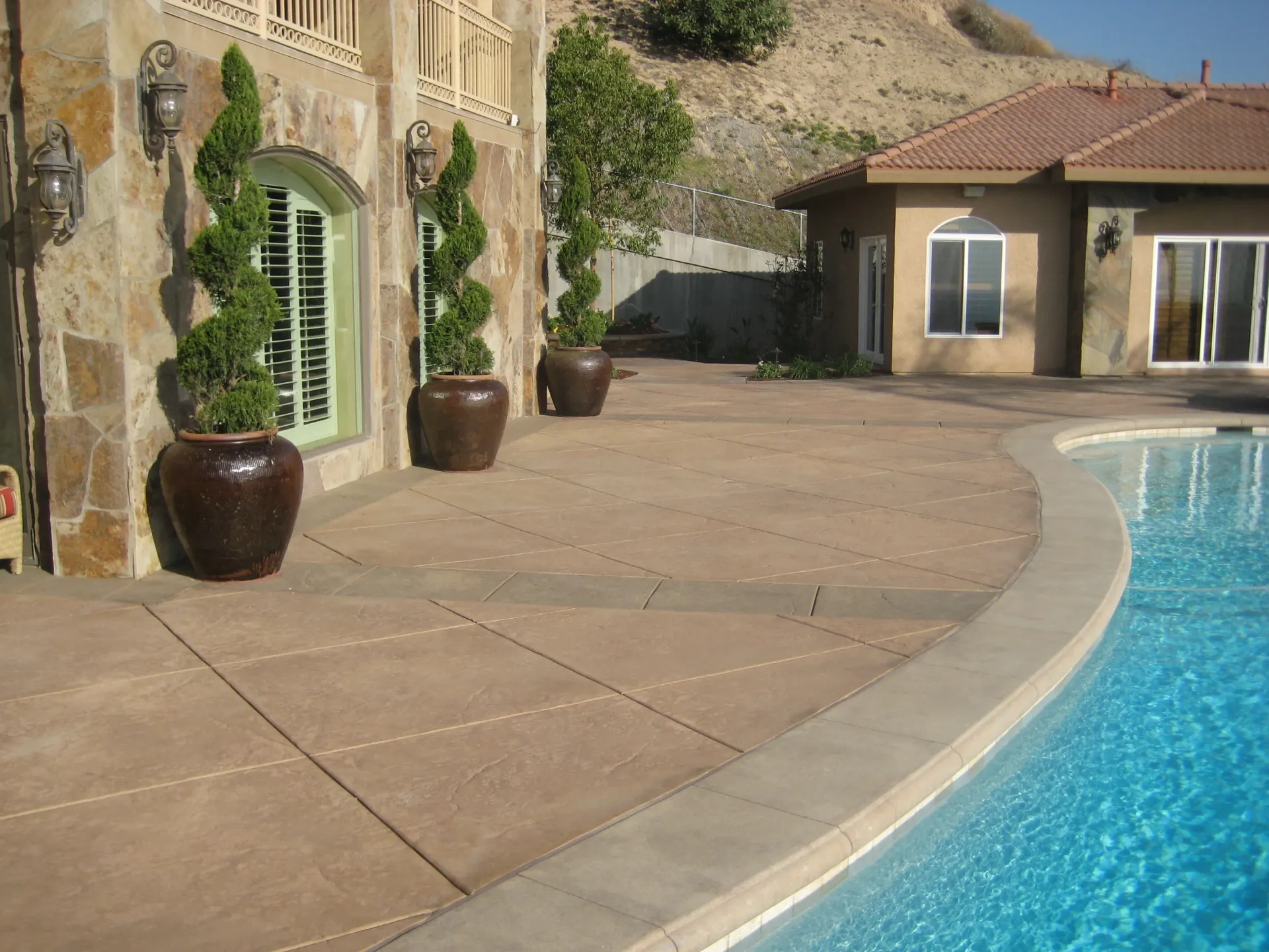 Superior Concrete Construction decorative concrete around swimming pool