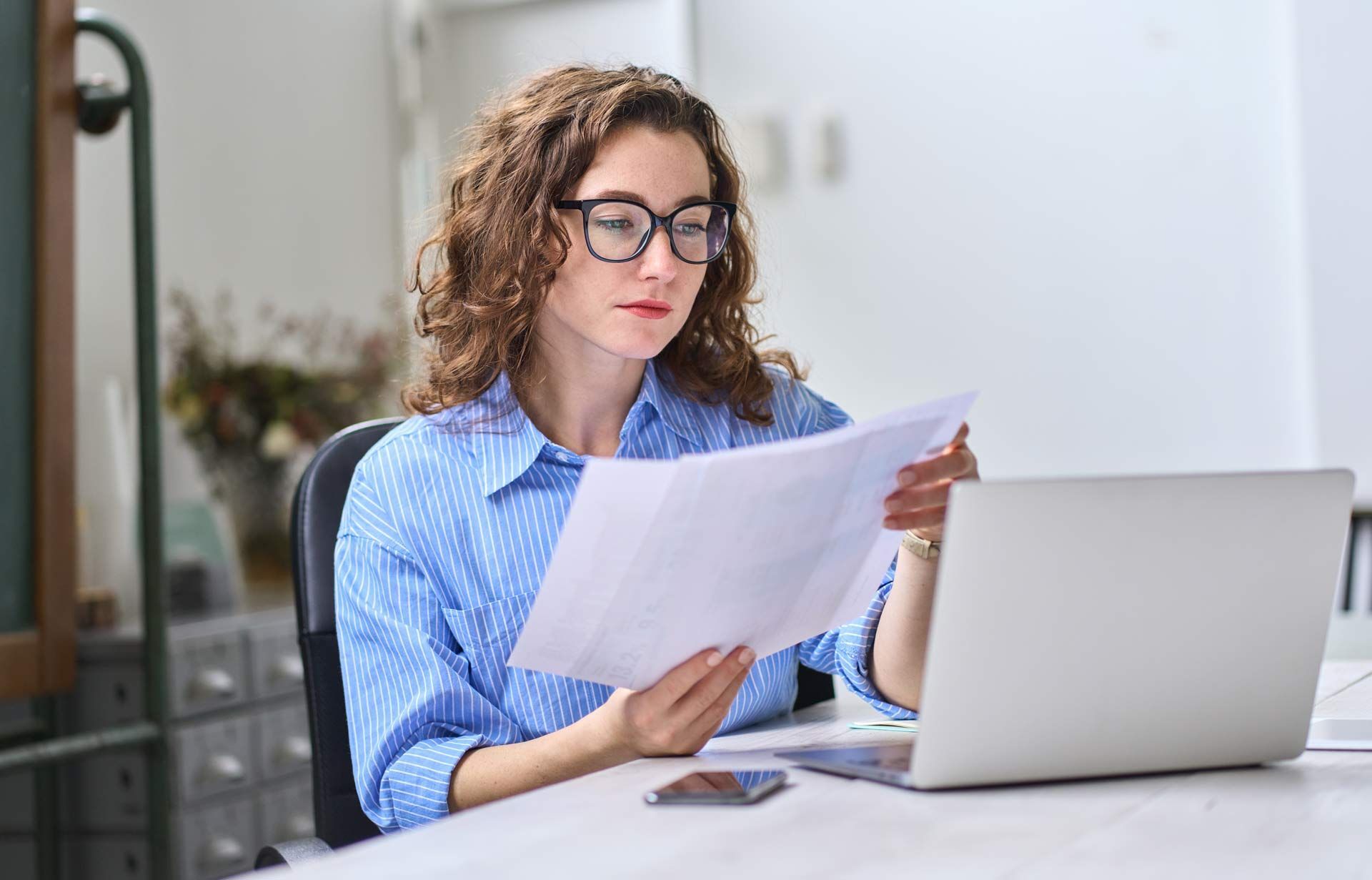 Woman Checking Her Tax Files