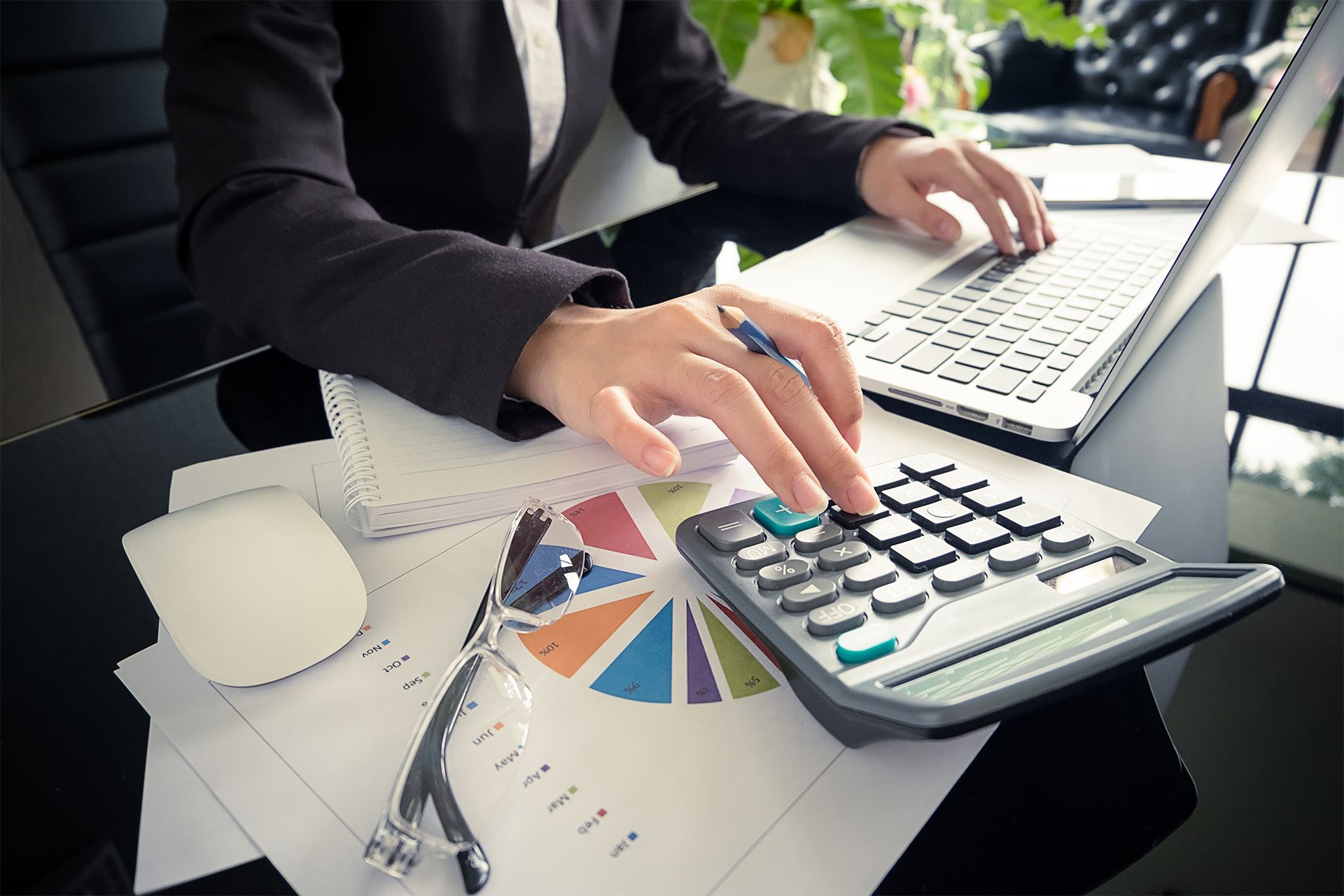 Accountant Using a Calculator