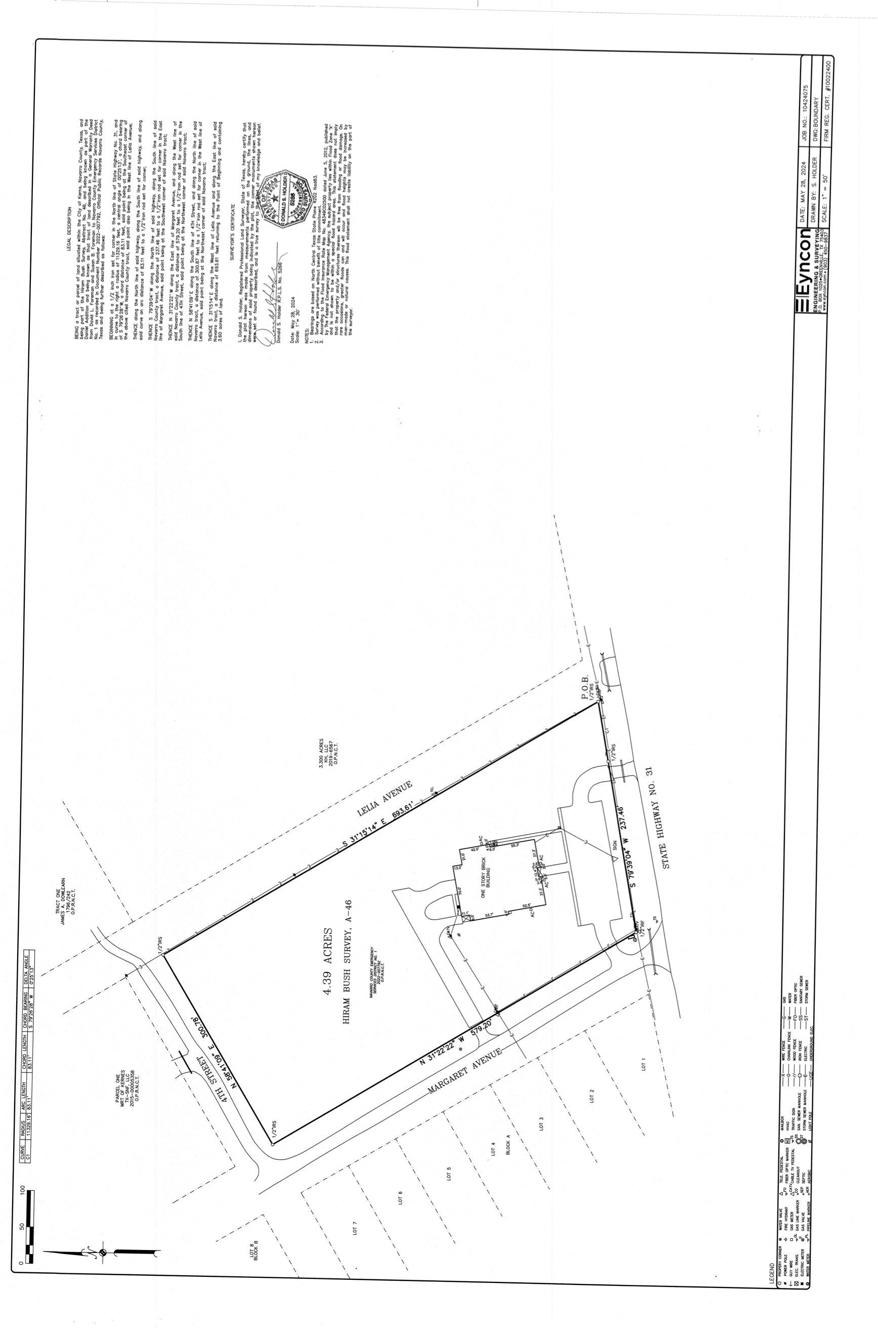 Survey plan of a property showing lot lines, building outline, and text details.