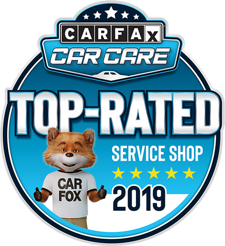 Carfax Top-Rated Service Shop badge with Car Fox mascot giving a thumbs-up. Blue and white colors. 2019. | TNT Tire Point S Auto Service