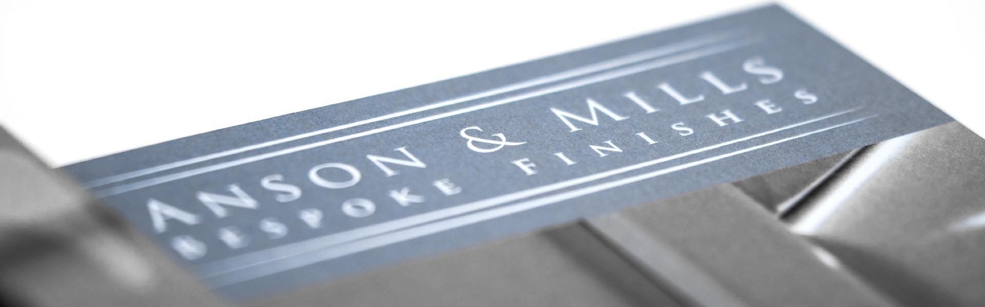 A close up of a business card for anson & mills