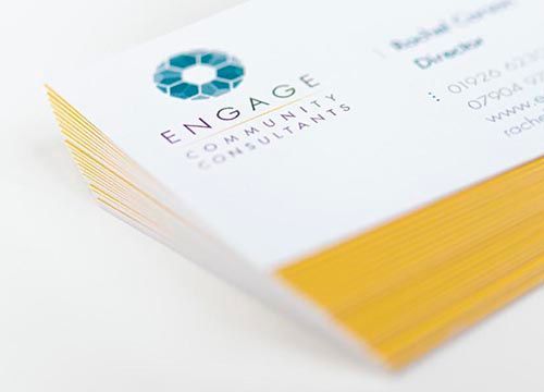 a close up of a stack of business cards on a table .