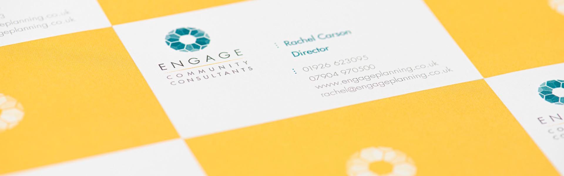 a close up of a business card for engage community consultants