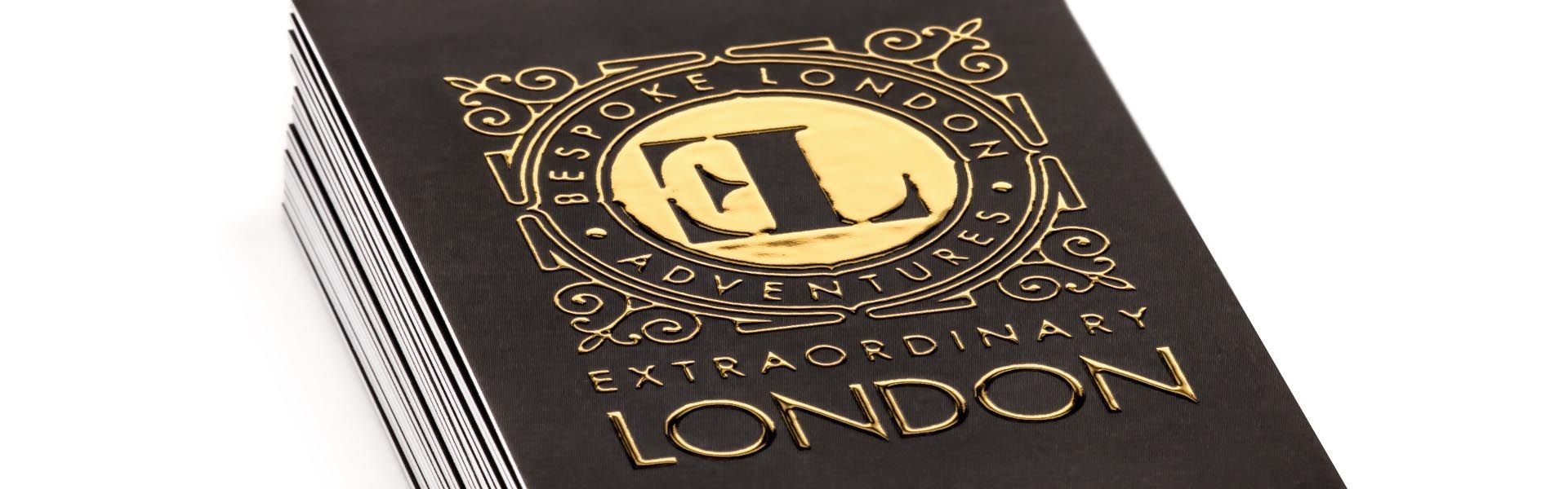 a black and gold business card for extraordinary london